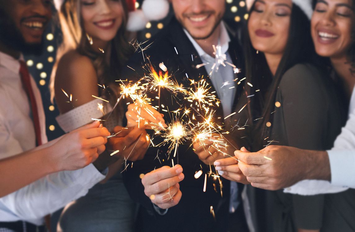 Friends celebrating with sparklers