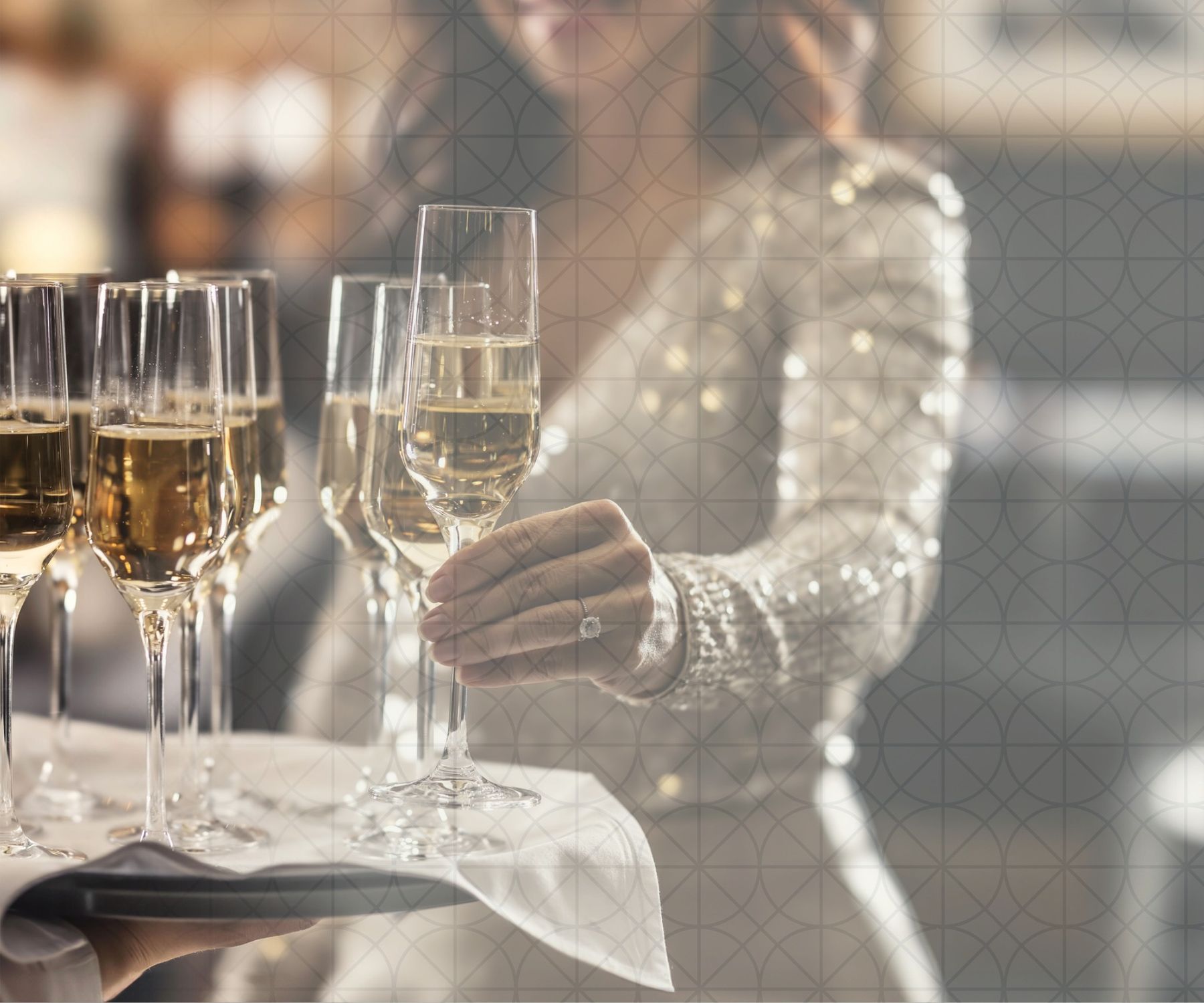 Glasses of champagne raised at a festive celebration