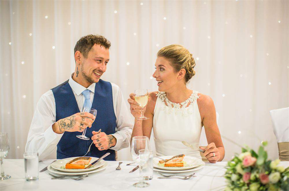 Romantic wedding celebration with guests dining at Brandon Hall Hotel & Spa.